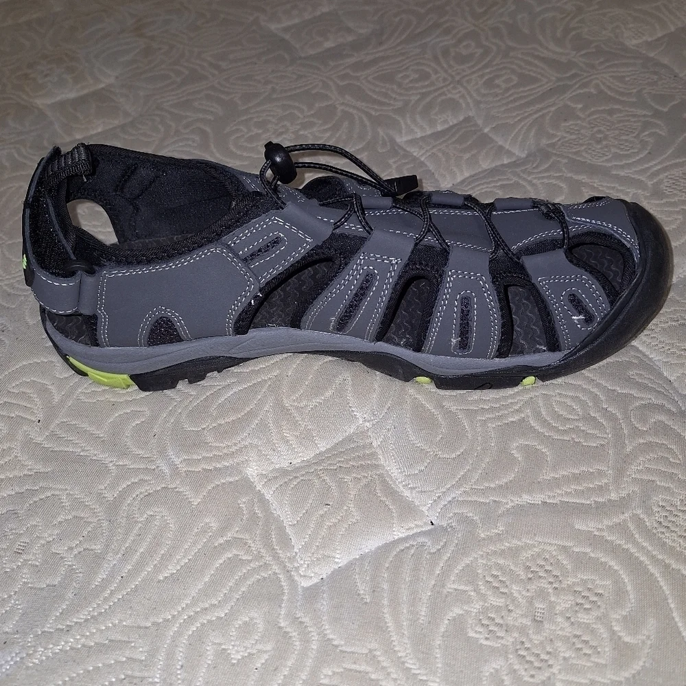 A pair of Coleman George sandals in a men's size 13M. They're in excellent shape